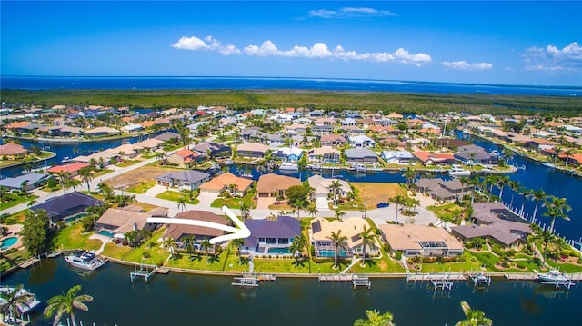 3520 Caya Largo Ct, Punta Gorda, FL 33950 - aerial view of property and surrounding area with a large body of water and nearby suburban area