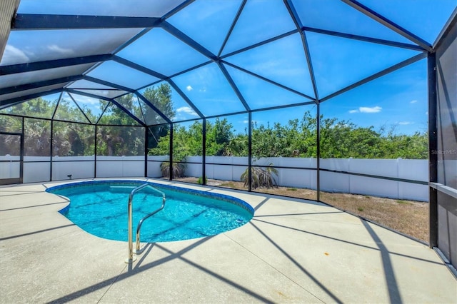 view of pool featuring a fenced in pool, a lanai, a fenced backyard, and a patio area