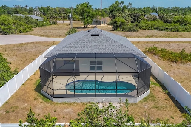 view of pool featuring a fenced in pool, a fenced backyard, a patio area, and a lawn