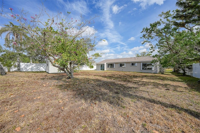 view of yard featuring fence
