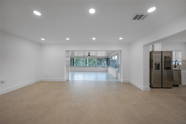 27385 Voyageur Dr, Punta Gorda, FL 33983 - empty room with a sink, recessed lighting, baseboards, and ceiling fan
