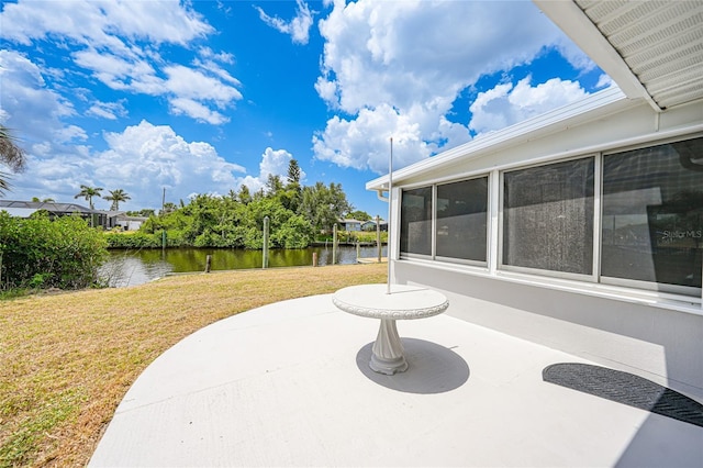 27385 Voyageur Dr, Punta Gorda, FL 33983 - view of patio / terrace with a water view