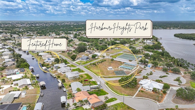 27385 Voyageur Dr, Punta Gorda, FL 33983 - aerial view of property's location featuring a nearby body of water and nearby suburban area