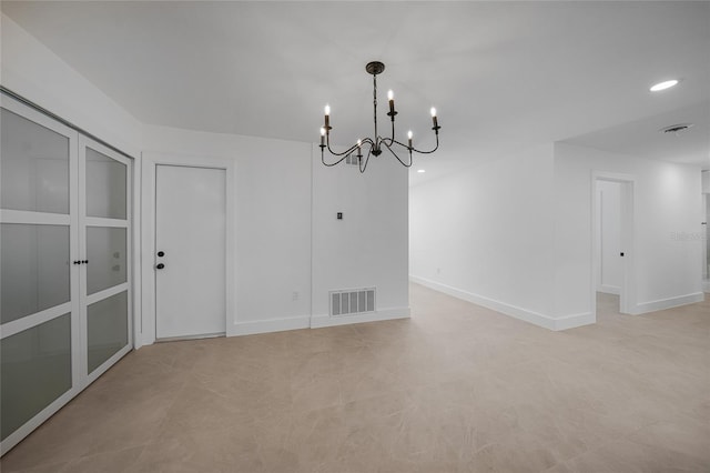27385 Voyageur Dr, Punta Gorda, FL 33983 - unfurnished dining area featuring a chandelier, recessed lighting, and baseboards