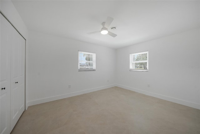 27385 Voyageur Dr, Punta Gorda, FL 33983 - unfurnished bedroom featuring a closet, a ceiling fan, and baseboards