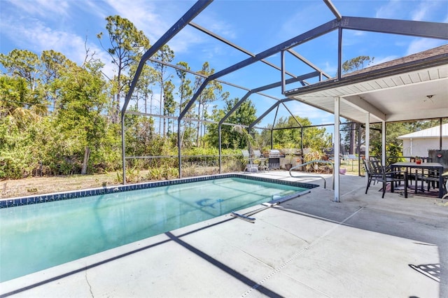 outdoor pool featuring a patio, glass enclosure, and outdoor dining space