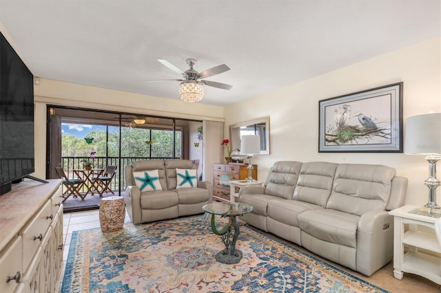 living area featuring a ceiling fan