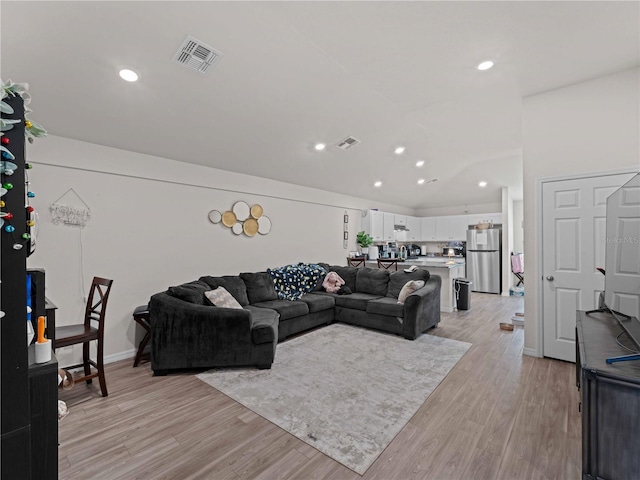 15579/15581 Chamberlain Blvd, Port Charlotte, FL 33953 - living room featuring recessed lighting, light wood-style flooring, and visible vents