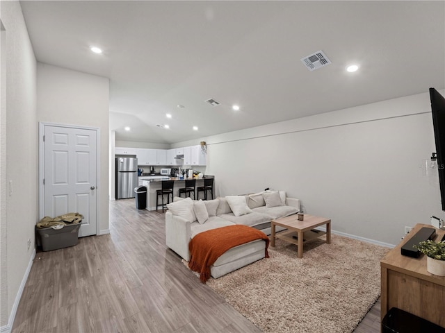 15579/15581 Chamberlain Blvd, Port Charlotte, FL 33953 - living area with recessed lighting, baseboards, light wood finished floors, and visible vents