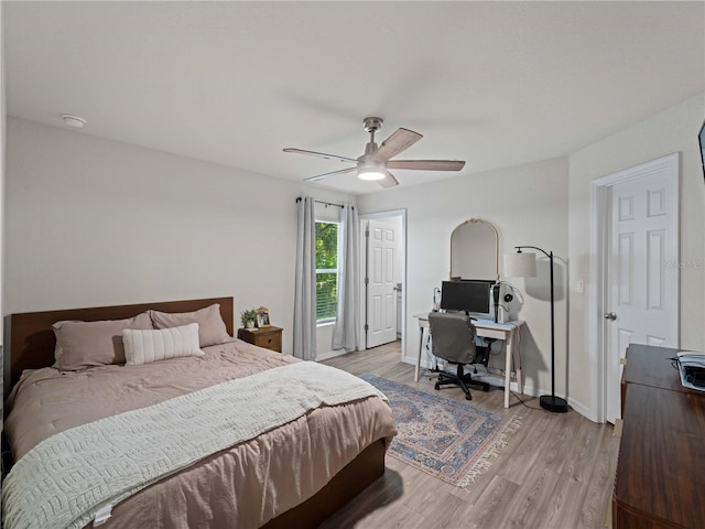 15579/15581 Chamberlain Blvd, Port Charlotte, FL 33953 - bedroom with baseboards, ceiling fan, and light wood-type flooring