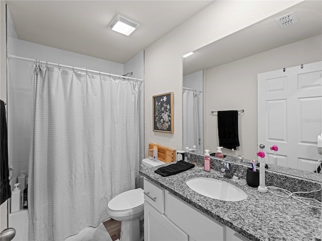 15579/15581 Chamberlain Blvd, Port Charlotte, FL 33953 - full bath featuring vanity, shower / bath combo, toilet, and visible vents