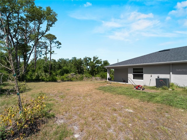 15579/15581 Chamberlain Blvd, Port Charlotte, FL 33953 - view of yard with central air condition unit