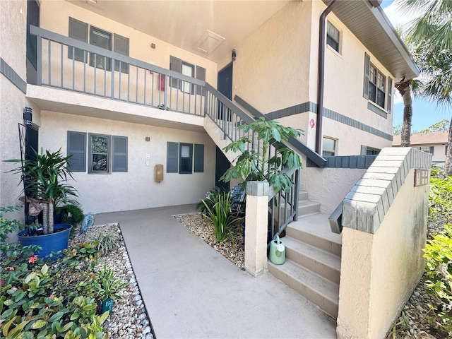 exterior space with stucco siding