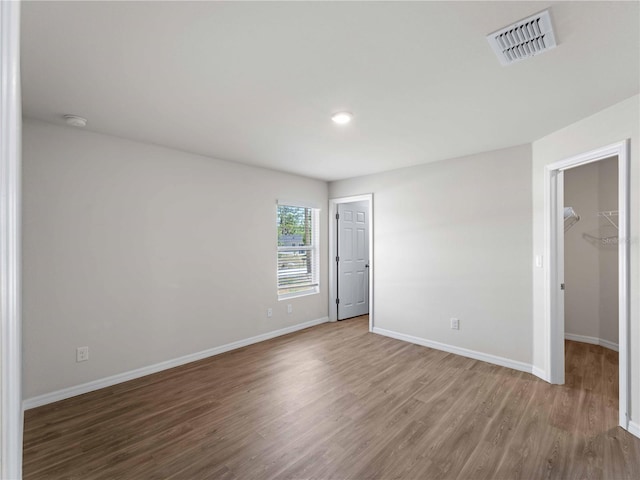 17190/17192 Nixon Ave, Port Charlotte, FL 33948 - interior space featuring baseboards, wood finished floors, and visible vents