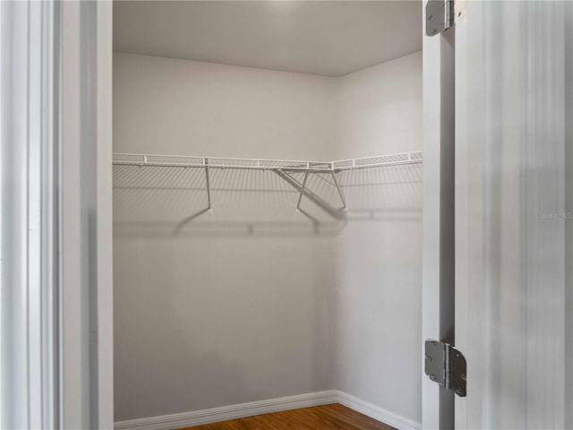 17190/17192 Nixon Ave, Port Charlotte, FL 33948 - spacious closet featuring dark wood finished floors