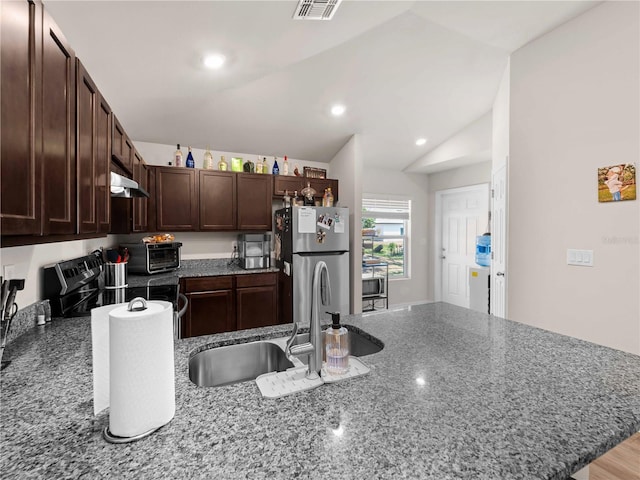 17190/17192 Nixon Ave, Port Charlotte, FL 33948 - kitchen featuring under cabinet range hood, dark brown cabinets, a sink, lofted ceiling, and stainless steel appliances