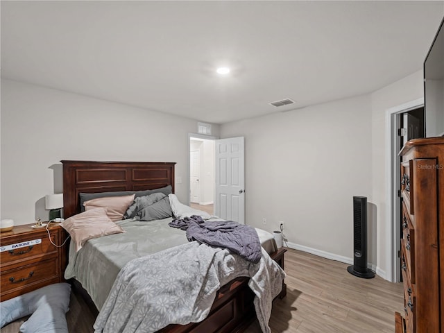 17190/17192 Nixon Ave, Port Charlotte, FL 33948 - bedroom featuring visible vents, baseboards, and light wood-type flooring