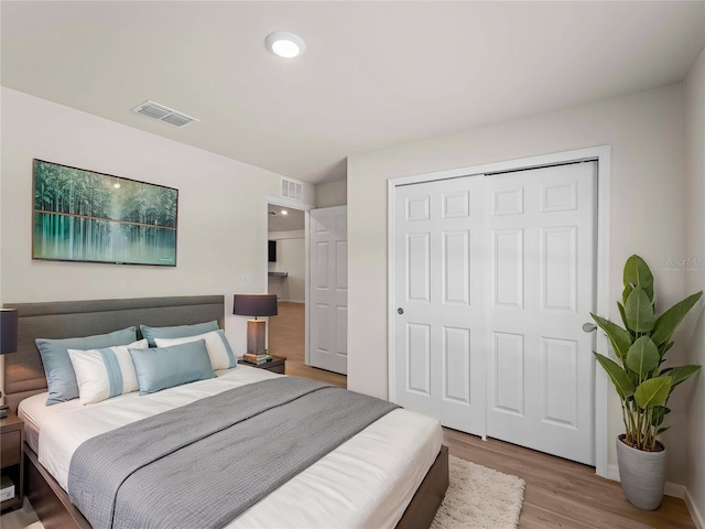 17190/17192 Nixon Ave, Port Charlotte, FL 33948 - bedroom featuring visible vents, light wood-style flooring, and a closet