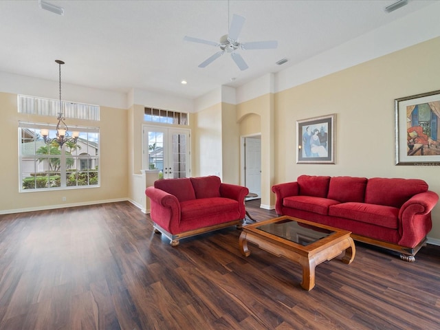857 Macaw Cir, Venice, FL 34285 - living area with visible vents, wood finished floors, and ceiling fan with notable chandelier