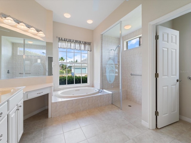 857 Macaw Cir, Venice, FL 34285 - bathroom featuring tile patterned floors, vanity, a tile shower, and a bath