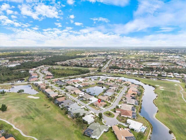 857 Macaw Cir, Venice, FL 34285 - drone / aerial view featuring a water view, golf course view, and a residential view