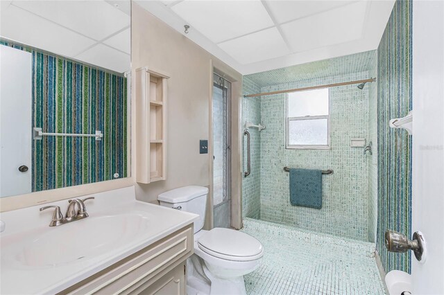 261 Caddy Rd, Rotonda West, FL 33947 - bathroom featuring a tile shower and vanity