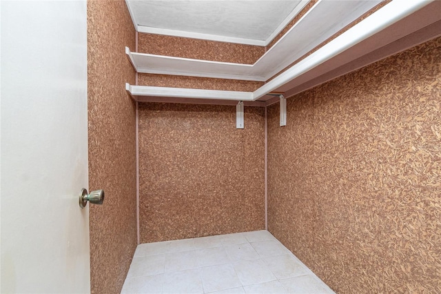 261 Caddy Rd, Rotonda West, FL 33947 - walk in closet with light tile patterned floors