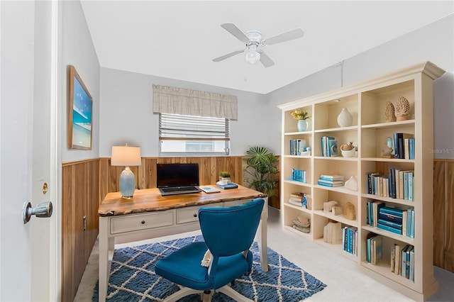 261 Caddy Rd, Rotonda West, FL 33947 - office featuring a wainscoted wall, ceiling fan, and wood walls