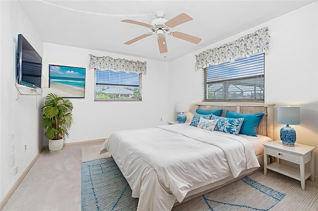 261 Caddy Rd, Rotonda West, FL 33947 - bedroom featuring multiple windows, carpet, and ceiling fan