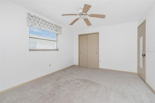 261 Caddy Rd, Rotonda West, FL 33947 - unfurnished room with light colored carpet and ceiling fan