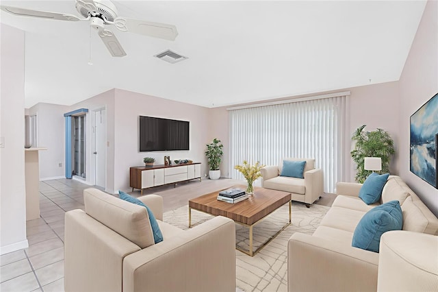 261 Caddy Rd, Rotonda West, FL 33947 - living area with ceiling fan, vaulted ceiling, and light tile patterned floors
