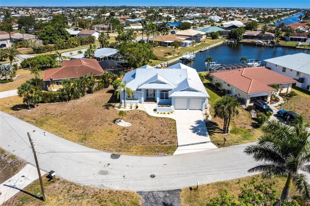 1711 Boca Raton Ct, Punta Gorda, FL 33950 - birds eye view of property featuring a water view and a residential view