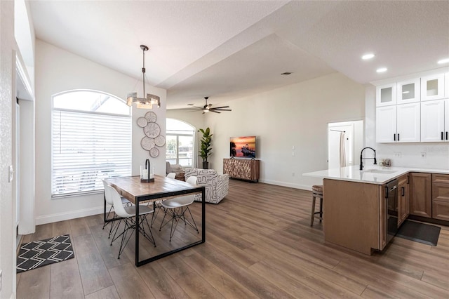 1711 Boca Raton Ct, Punta Gorda, FL 33950 - dining space with recessed lighting, a textured ceiling, baseboards, ceiling fan with notable chandelier, and wood finished floors