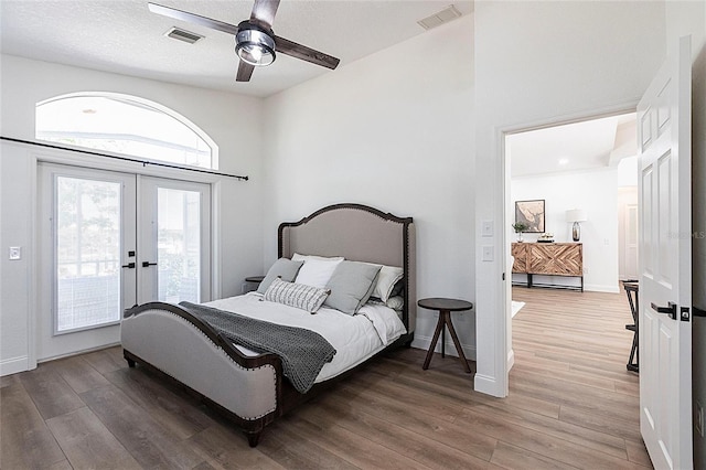 1711 Boca Raton Ct, Punta Gorda, FL 33950 - bedroom featuring wood finished floors, french doors, visible vents, and access to exterior