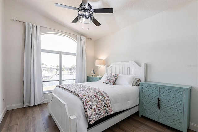 1711 Boca Raton Ct, Punta Gorda, FL 33950 - bedroom with a ceiling fan, baseboards, lofted ceiling, and dark wood-style floors