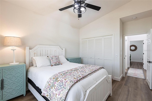 1711 Boca Raton Ct, Punta Gorda, FL 33950 - bedroom with lofted ceiling, a closet, baseboards, dark wood finished floors, and ceiling fan