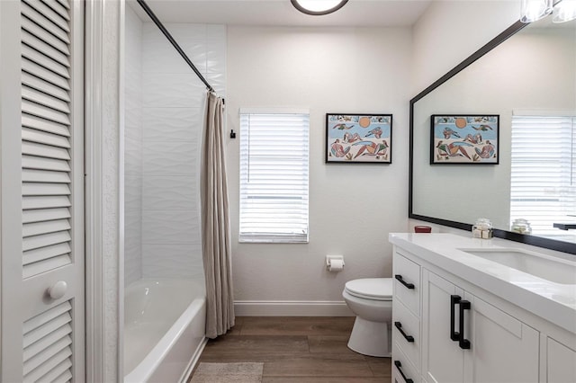 1711 Boca Raton Ct, Punta Gorda, FL 33950 - full bath featuring vanity, wood finished floors, baseboards, and a healthy amount of sunlight