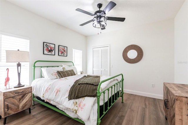 1711 Boca Raton Ct, Punta Gorda, FL 33950 - bedroom featuring baseboards, a ceiling fan, a closet, and wood finished floors