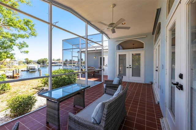1711 Boca Raton Ct, Punta Gorda, FL 33950 - sunroom / solarium with a water view, french doors, and a ceiling fan