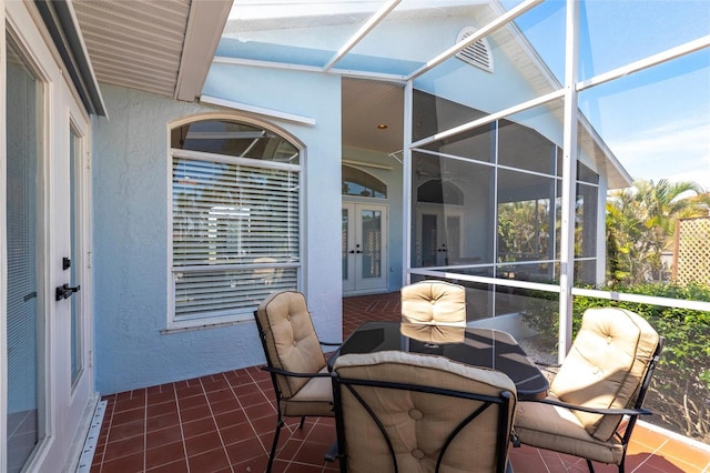 1711 Boca Raton Ct, Punta Gorda, FL 33950 - sunroom featuring outdoor dining area and french doors
