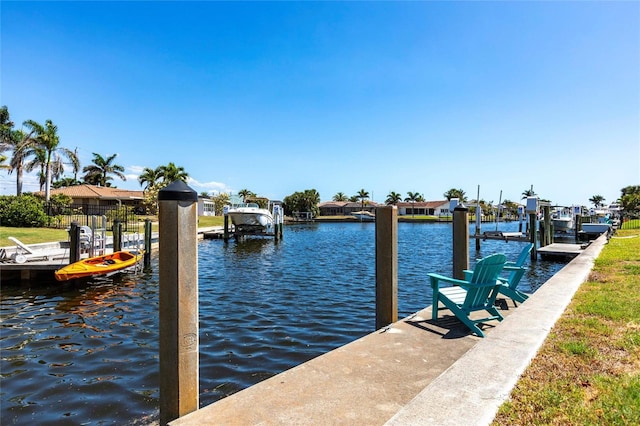 1711 Boca Raton Ct, Punta Gorda, FL 33950 - dock area featuring boat lift and a water view