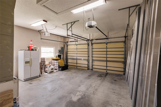 1711 Boca Raton Ct, Punta Gorda, FL 33950 - garage featuring a garage door opener and white fridge with ice dispenser