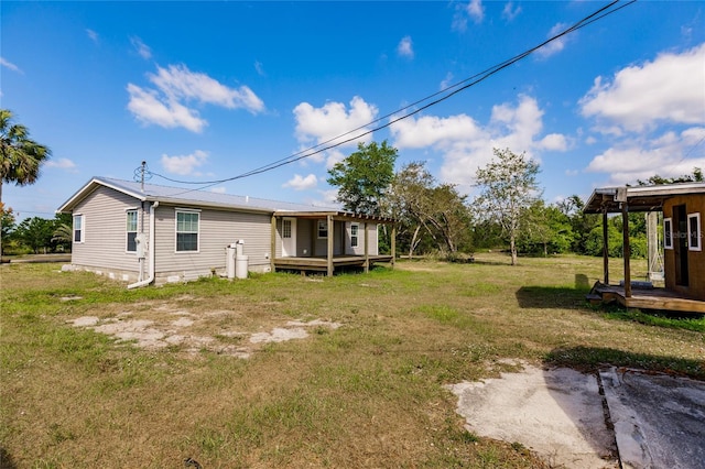 view of yard with a deck