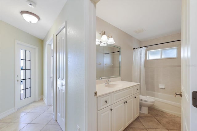 bathroom with vanity, toilet, tile patterned flooring, and shower / bath combo with shower curtain