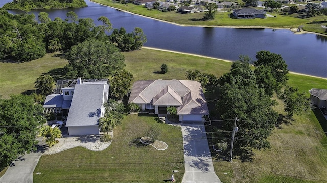birds eye view of property featuring a water view