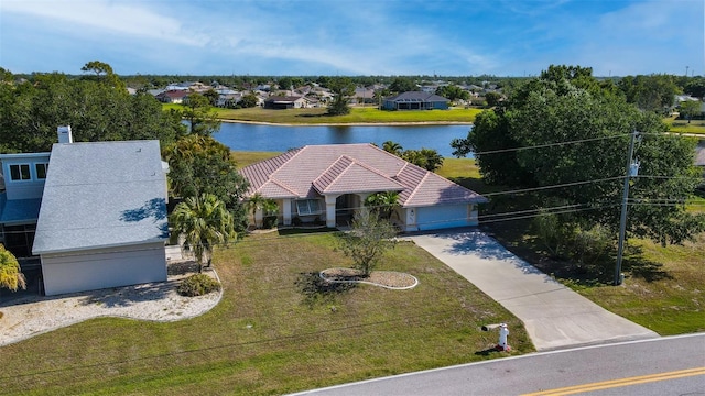 drone / aerial view featuring a water view