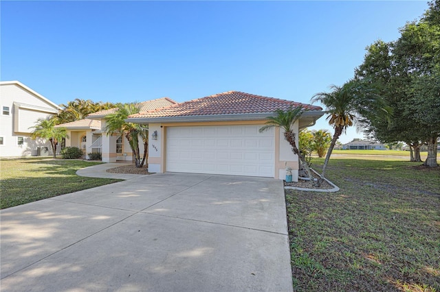 view of front facade with a front lawn, stucco siding, concrete driveway, an attached garage, and a tile roof