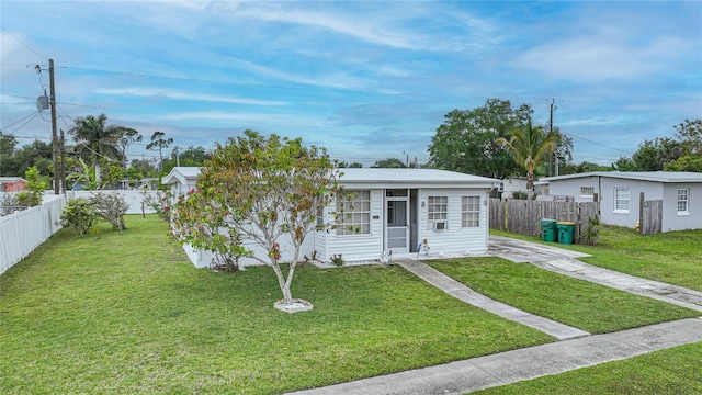 2321 Dallas St, Port Charlotte, FL 33952 - bungalow featuring fence and a front yard