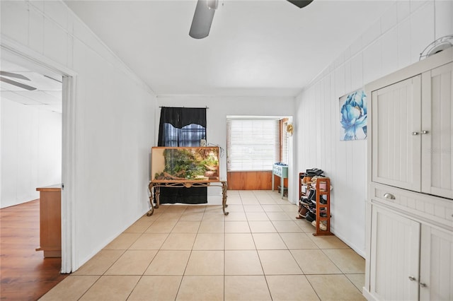 2321 Dallas St, Port Charlotte, FL 33952 - living area with light tile patterned floors and a ceiling fan