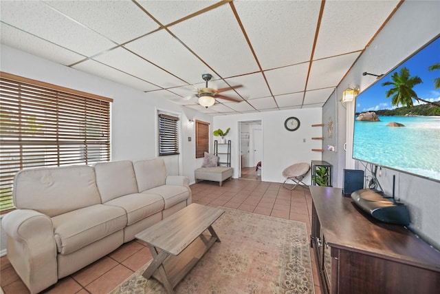 2321 Dallas St, Port Charlotte, FL 33952 - tiled living area with a healthy amount of sunlight, a ceiling fan, and a drop ceiling